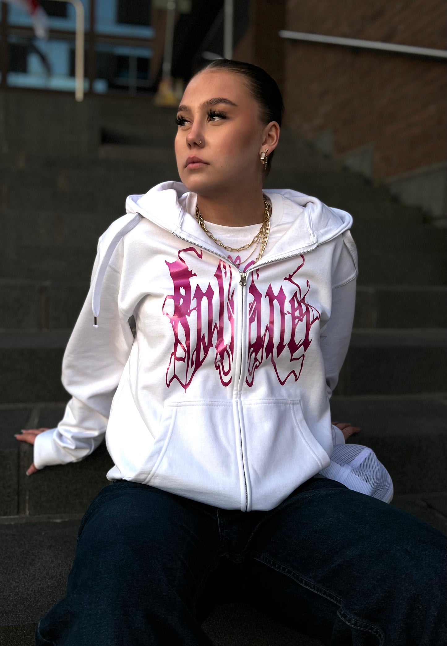 White zipper hoodie with pink logo