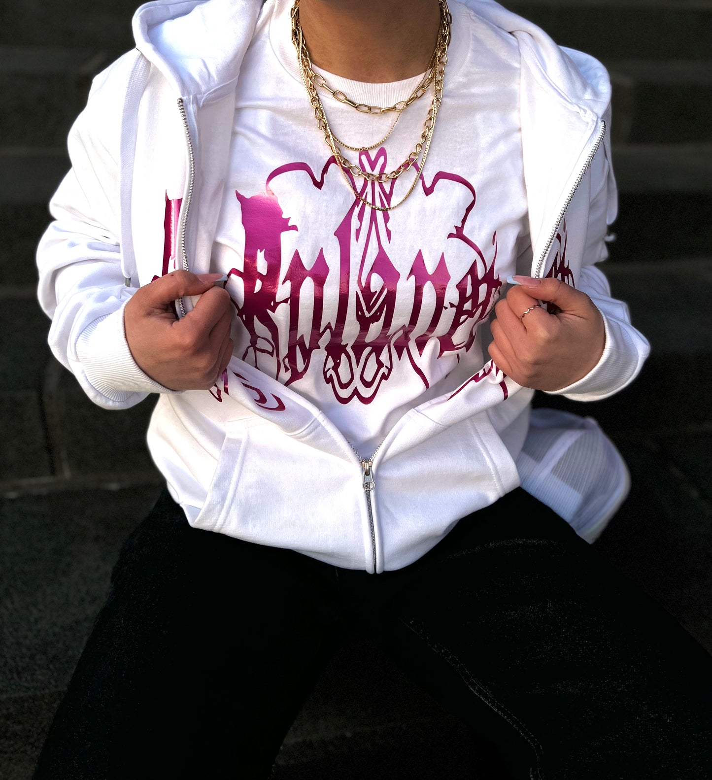 White t-shirt with pink logo