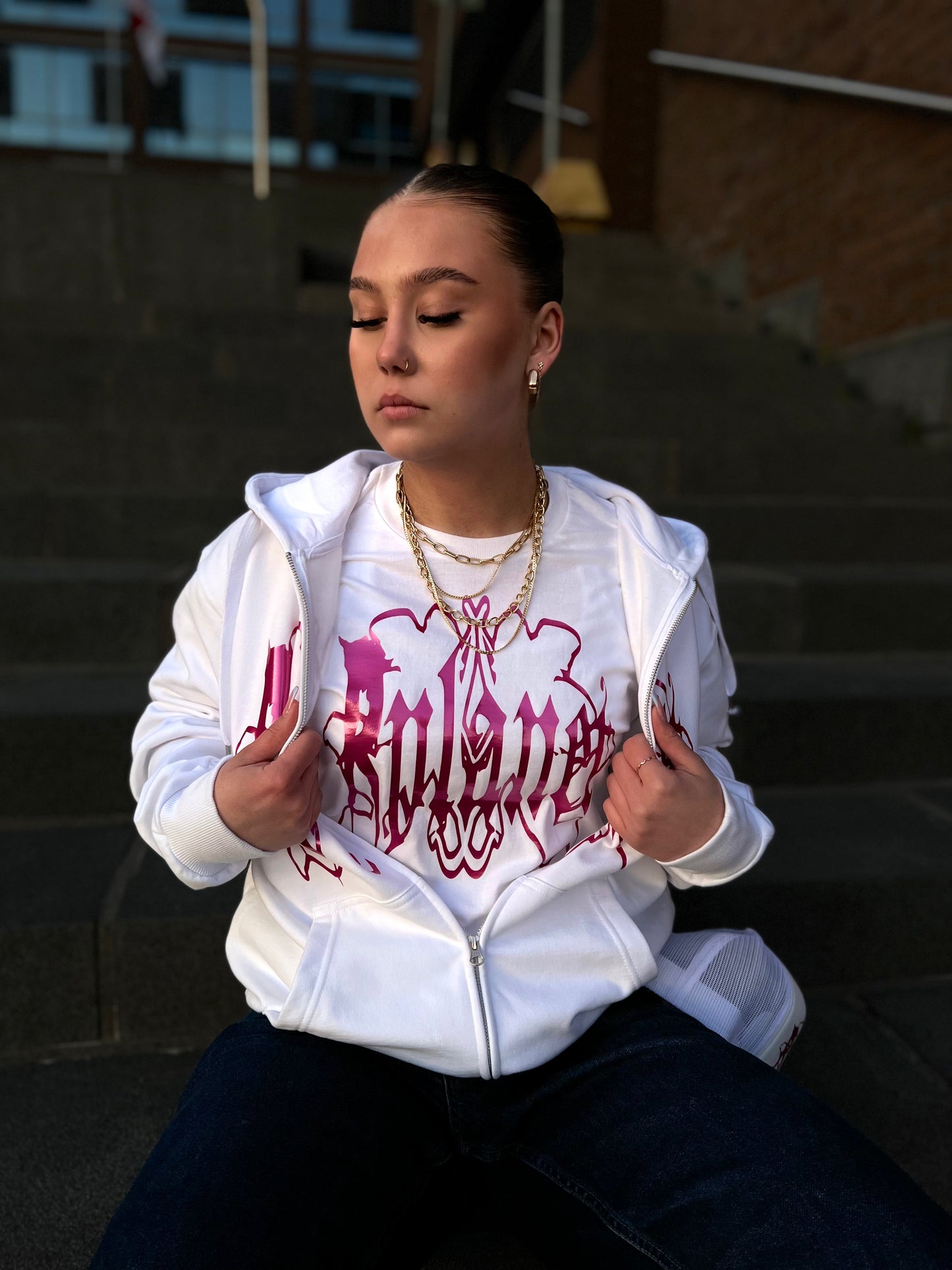 White t-shirt with pink logo