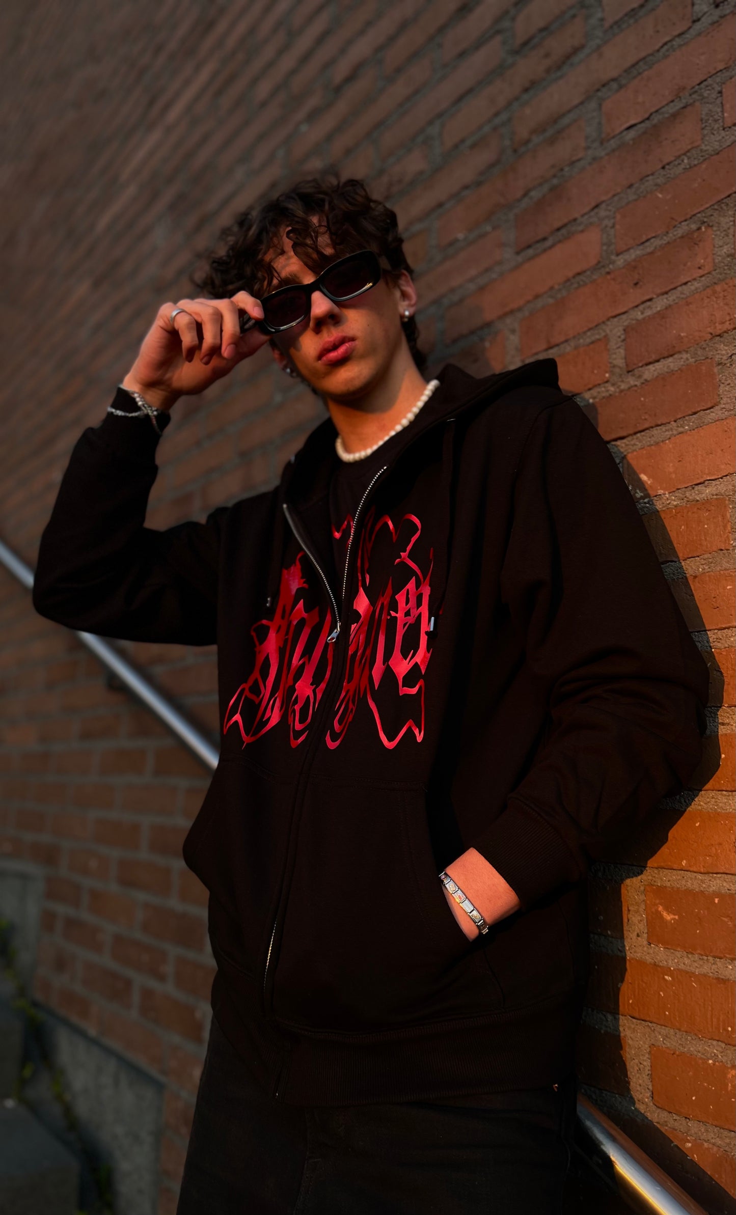 Black zipper hoodie with red logo